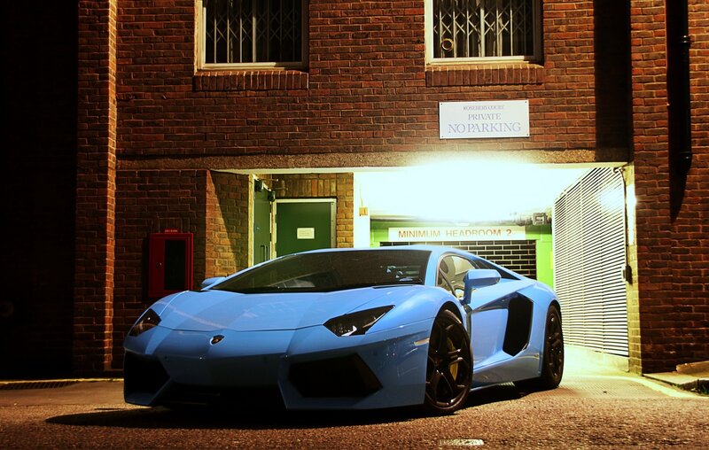Blue Lamborghini in alley