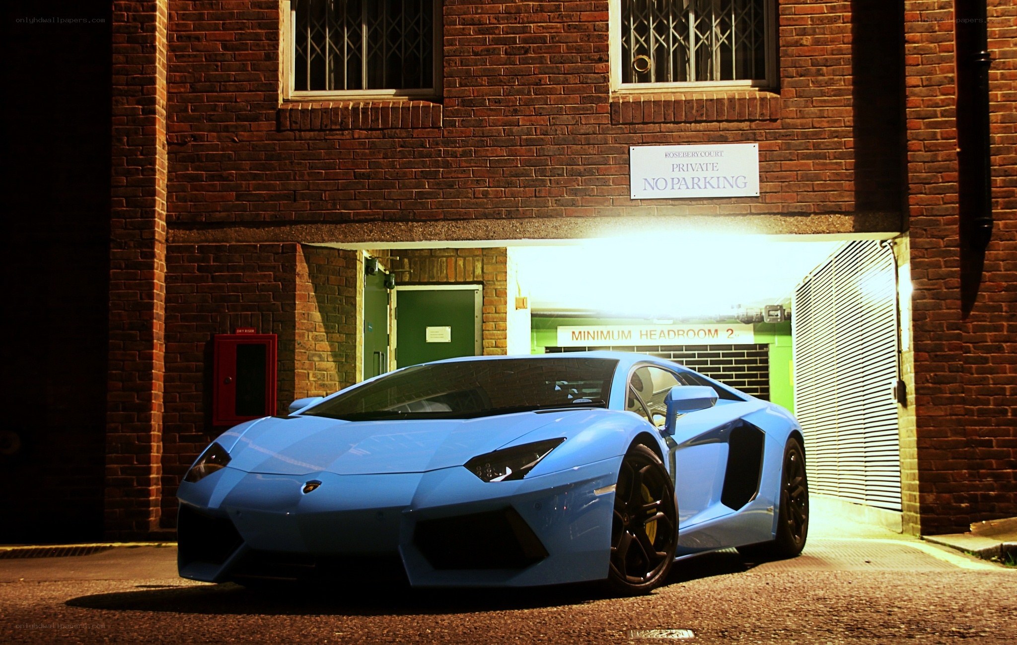Blue Lamborghini in alley