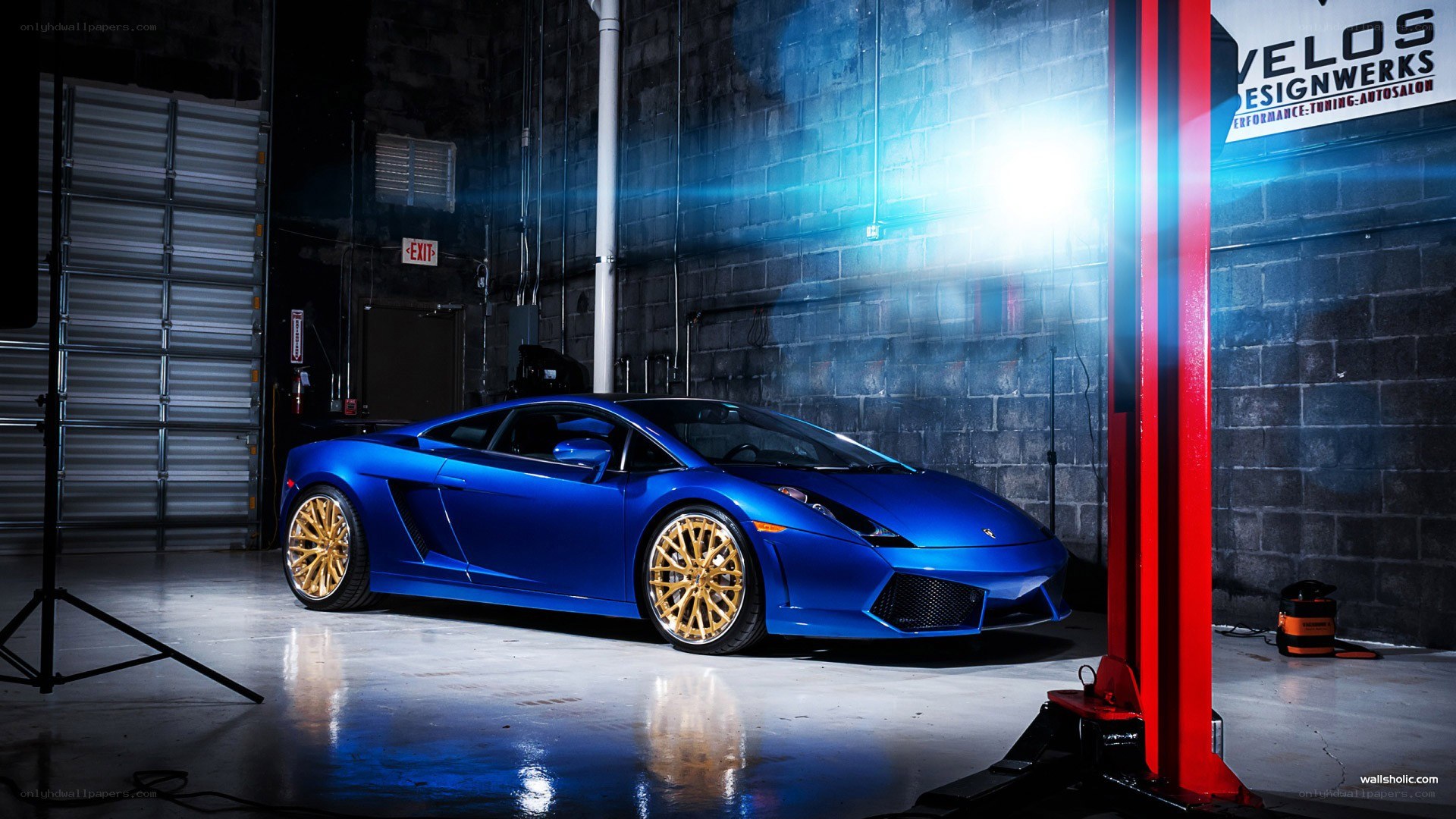 Blue Lamborghini in garage