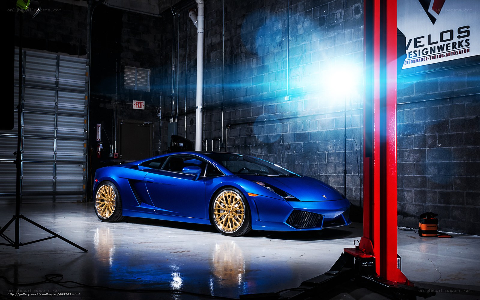 Blue Lamborghini in garage