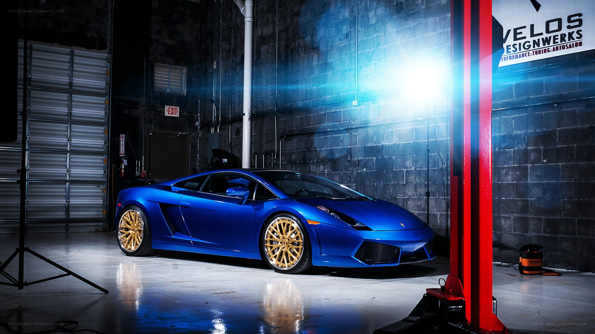 Blue Lamborghini in garage