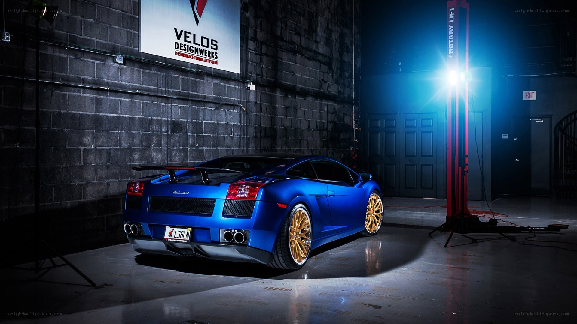 Blue Lamborghini in garage