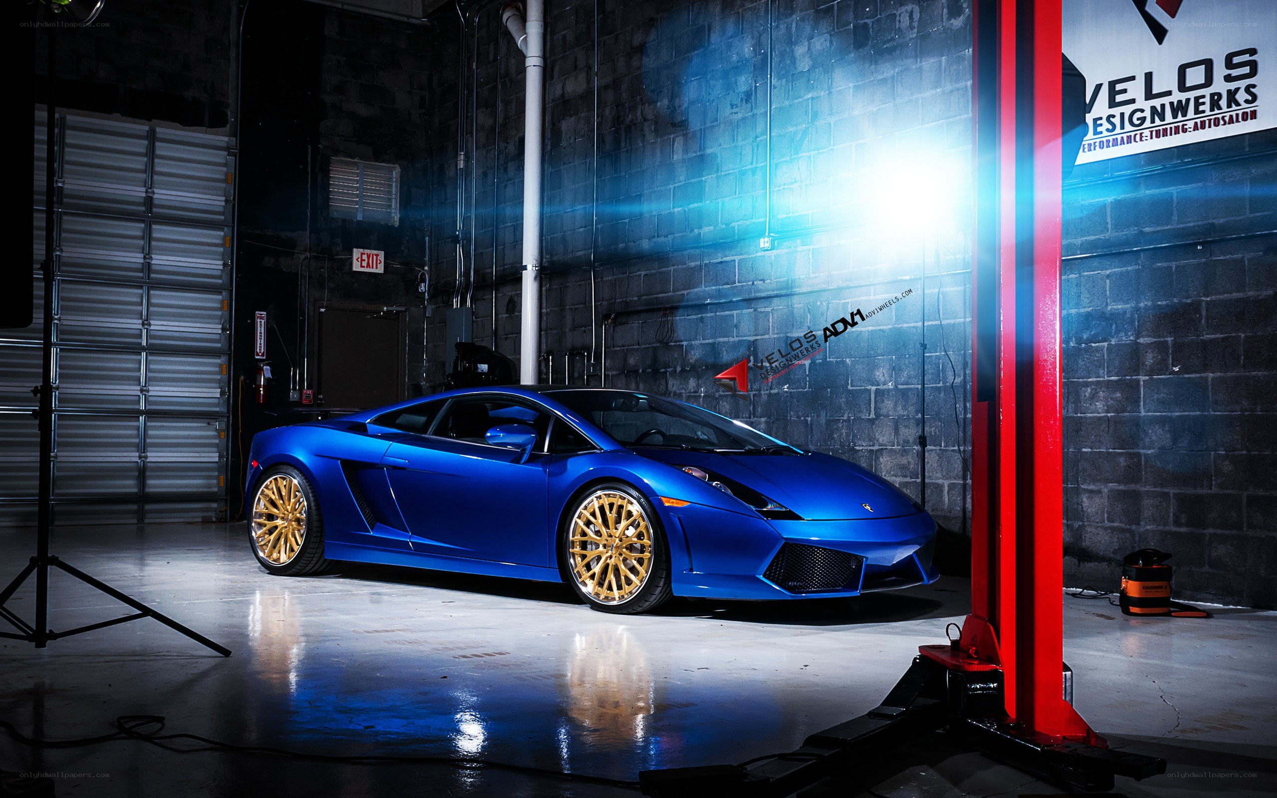 Blue Lamborghini in garage