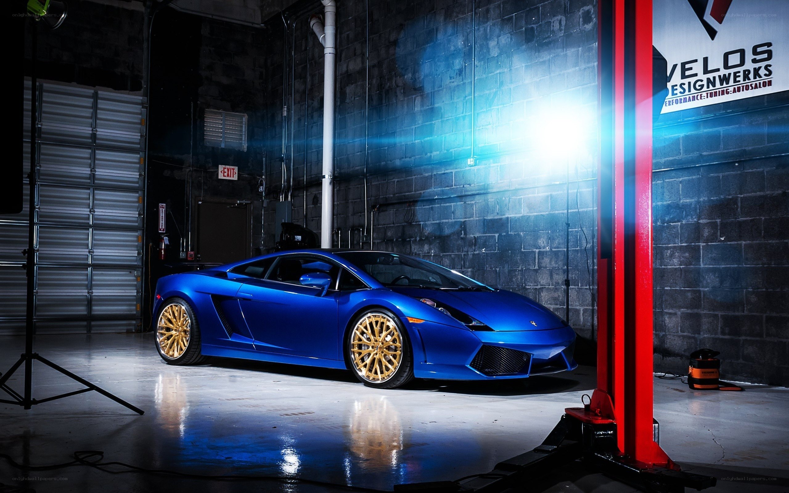 Blue Lamborghini in garage