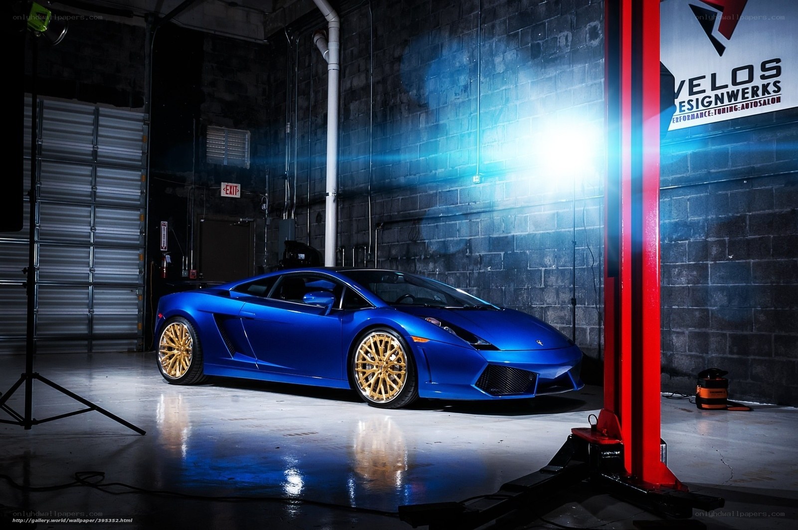 Blue Lamborghini in garage