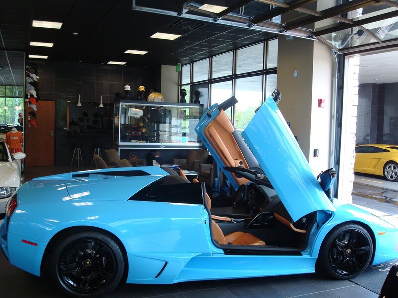Blue Lamborghini in showroom