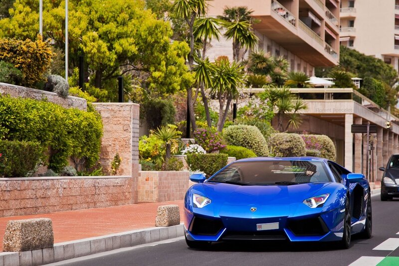 Blue Lamborghini on a city street