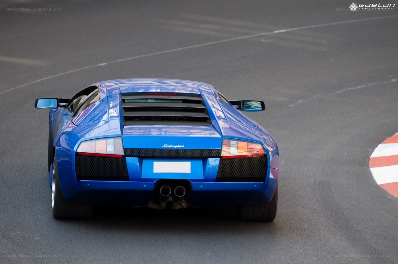Blue Lamborghini on a racetrack