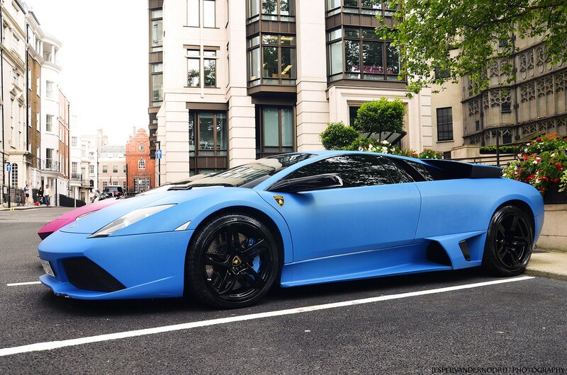 Blue Lamborghini on city street