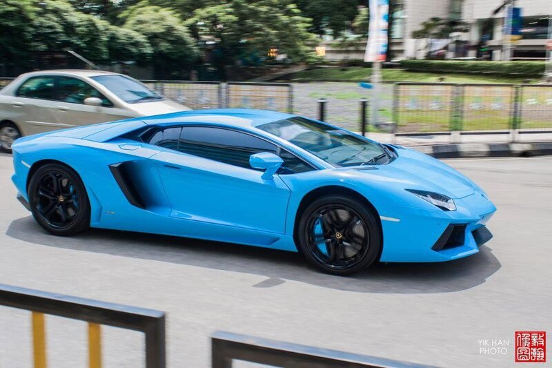 blue lamborghini on city street