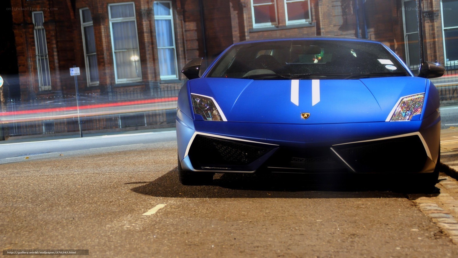 Blue Lamborghini on city street