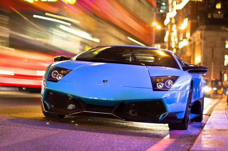 Blue Lamborghini on city street