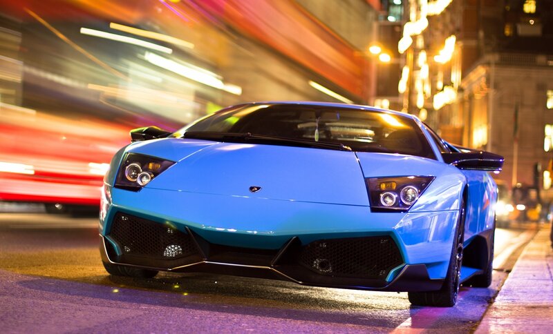 blue lamborghini on city street