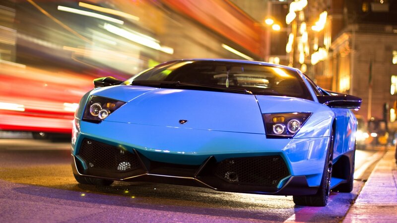 Blue Lamborghini on city street