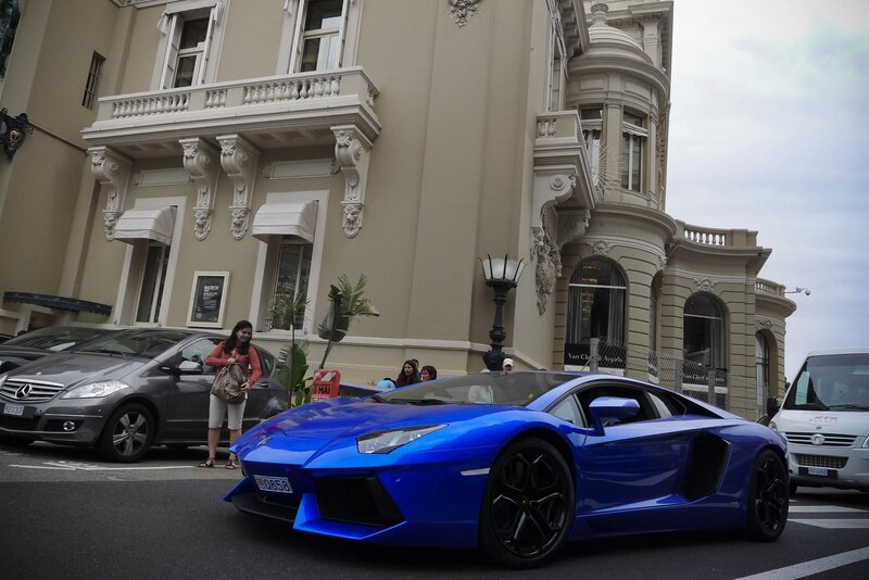 Blue Lamborghini on city street