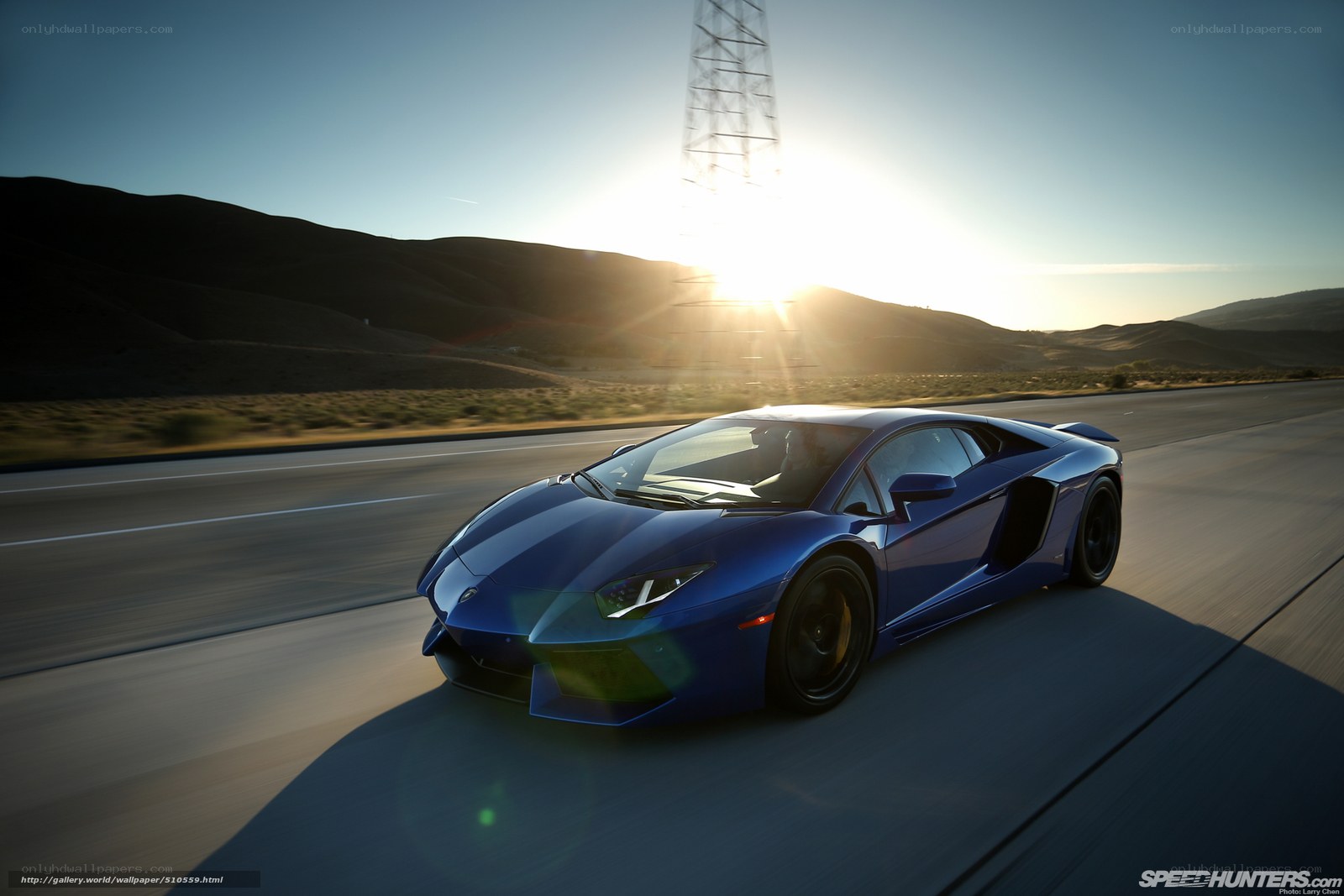 Blue Lamborghini on desert road