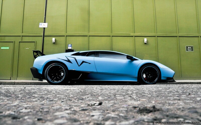 blue lamborghini on street
