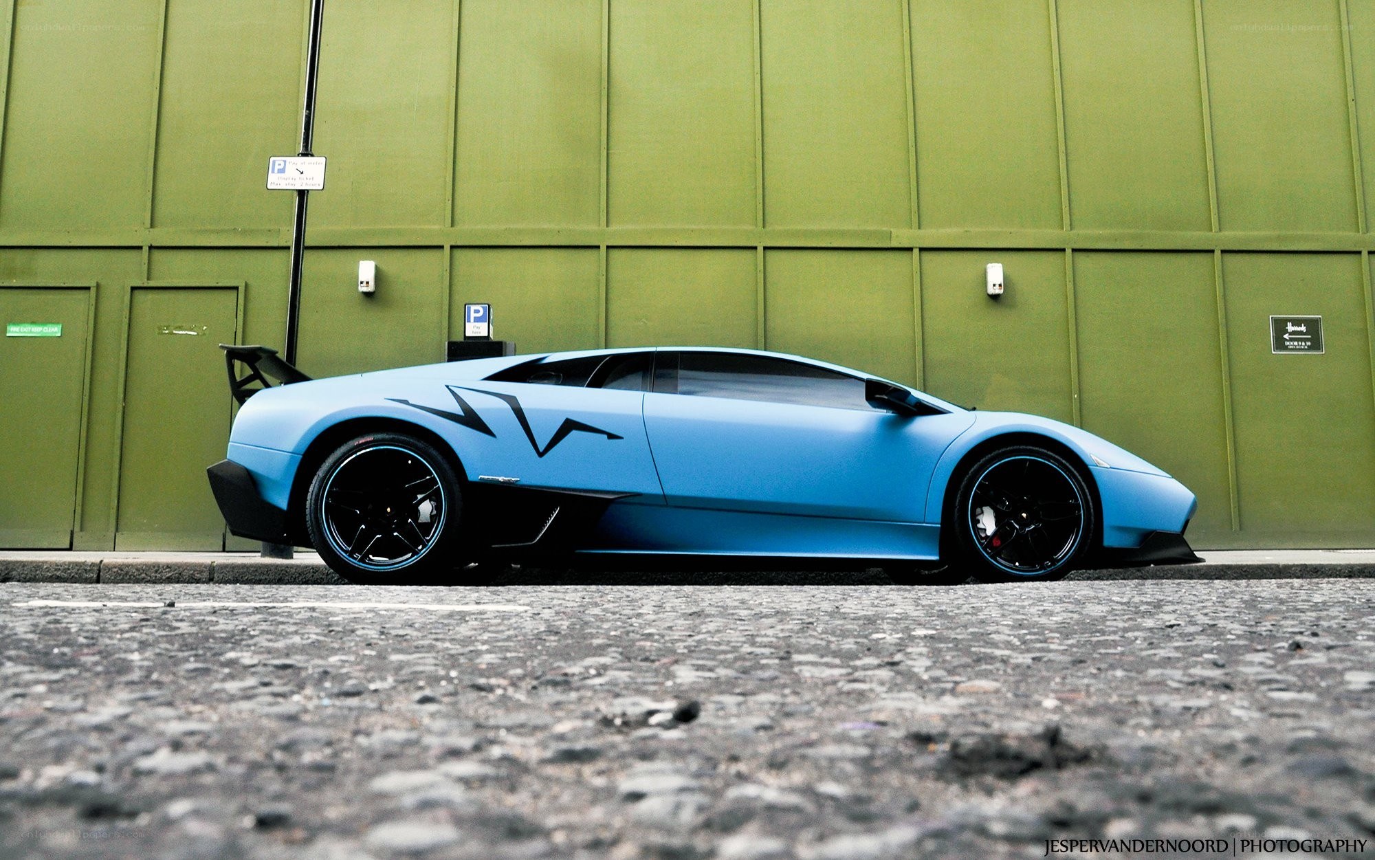 blue lamborghini on street
