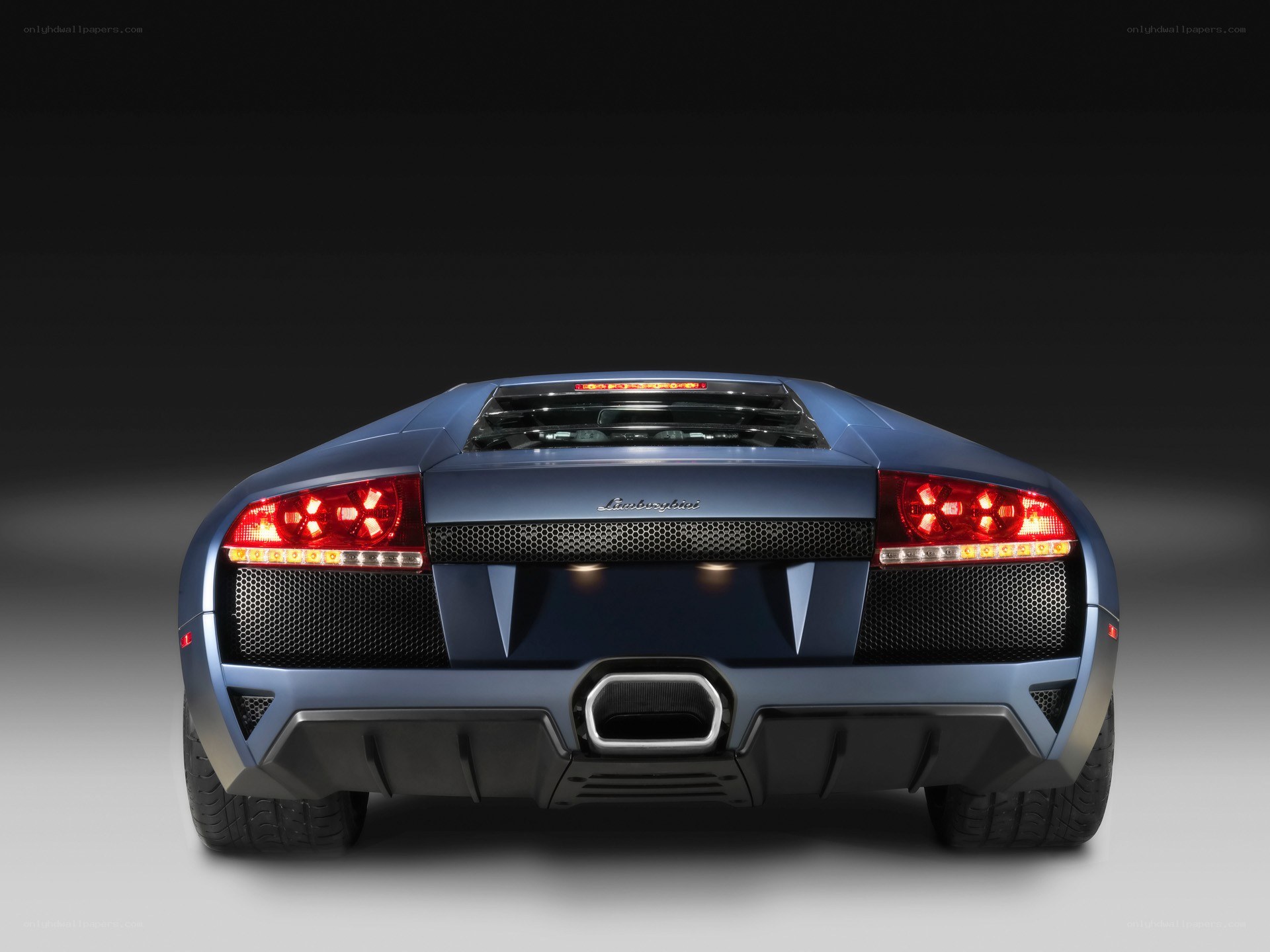 blue lamborghini rear view