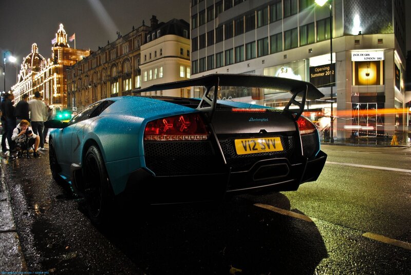 Blue Lamborghini Sports Car — Dramatic, Night, Photograph