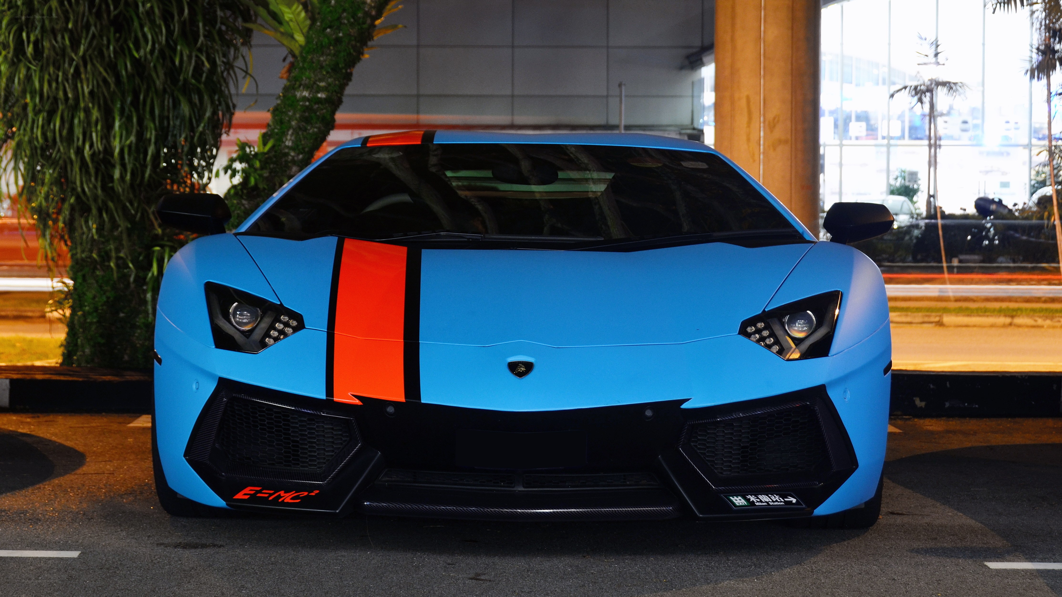 Blue Lamborghini with orange stripe
