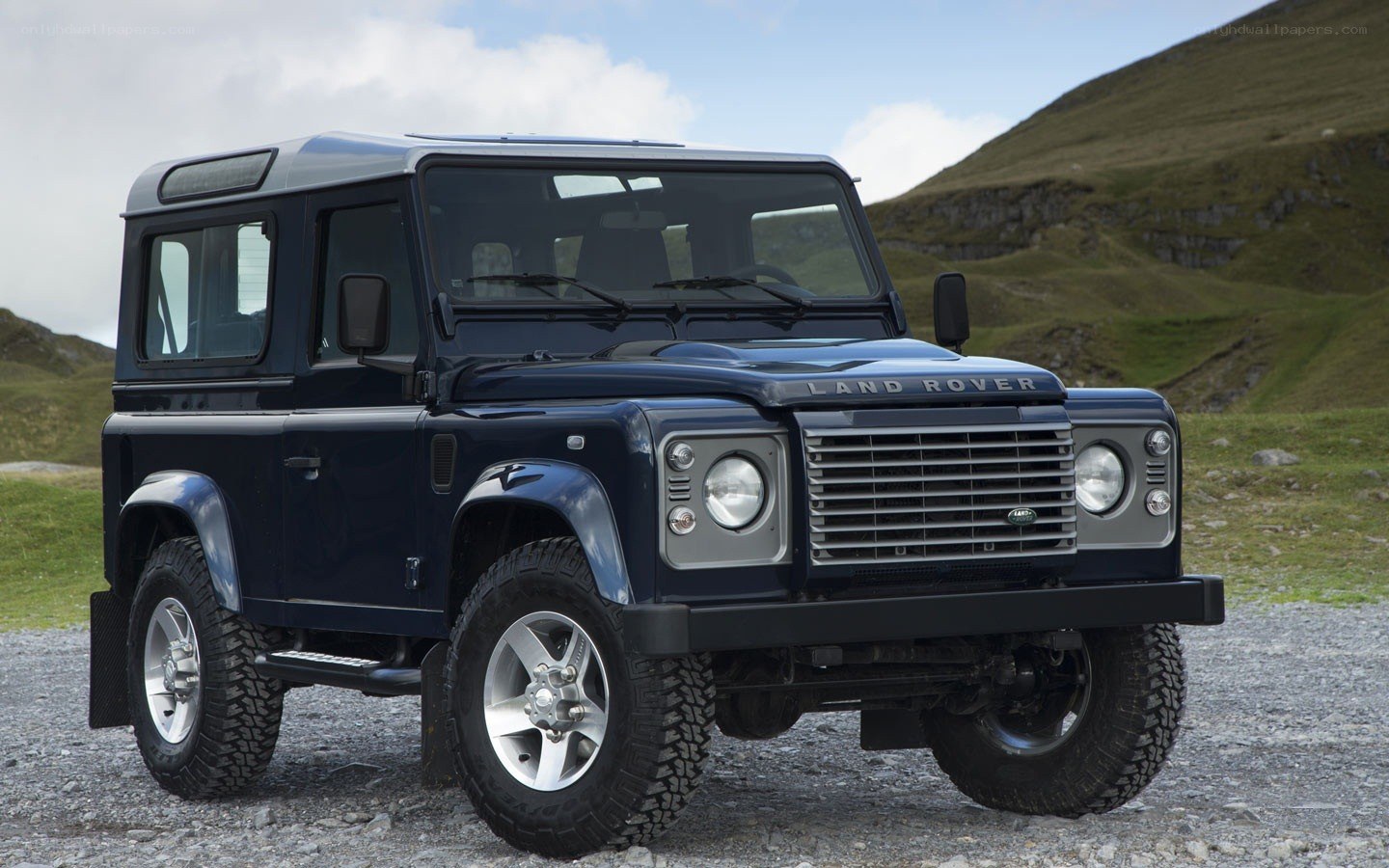 blue land rover defender