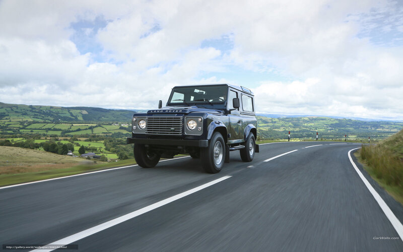 Blue Land Rover Driving