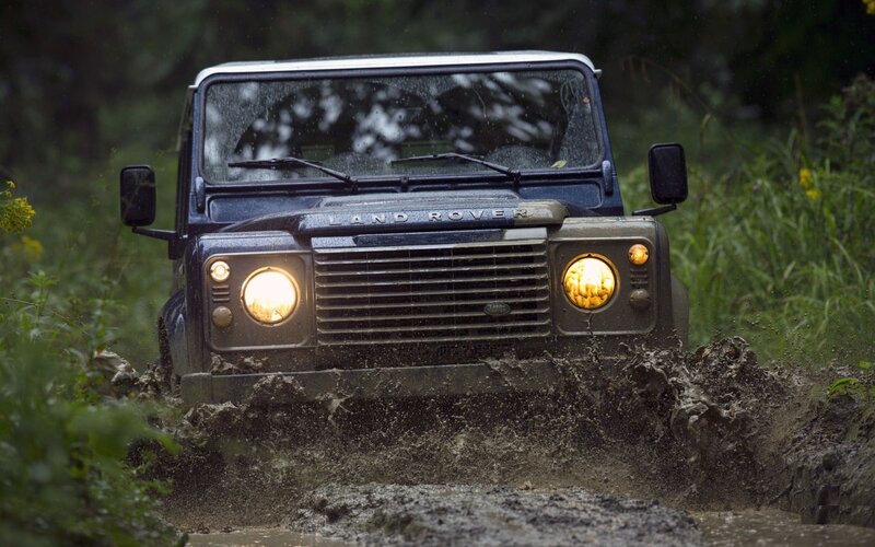 Blue Land Rover in Mud — Green