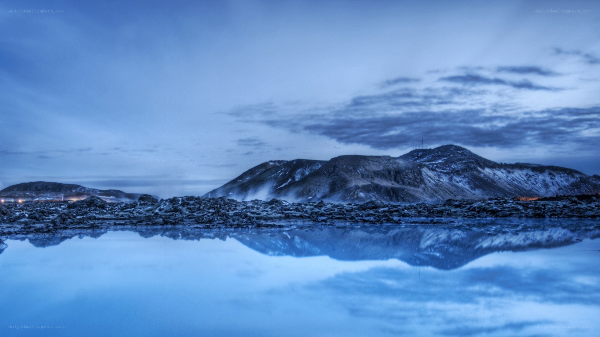 Blue landscape with mountain reflection