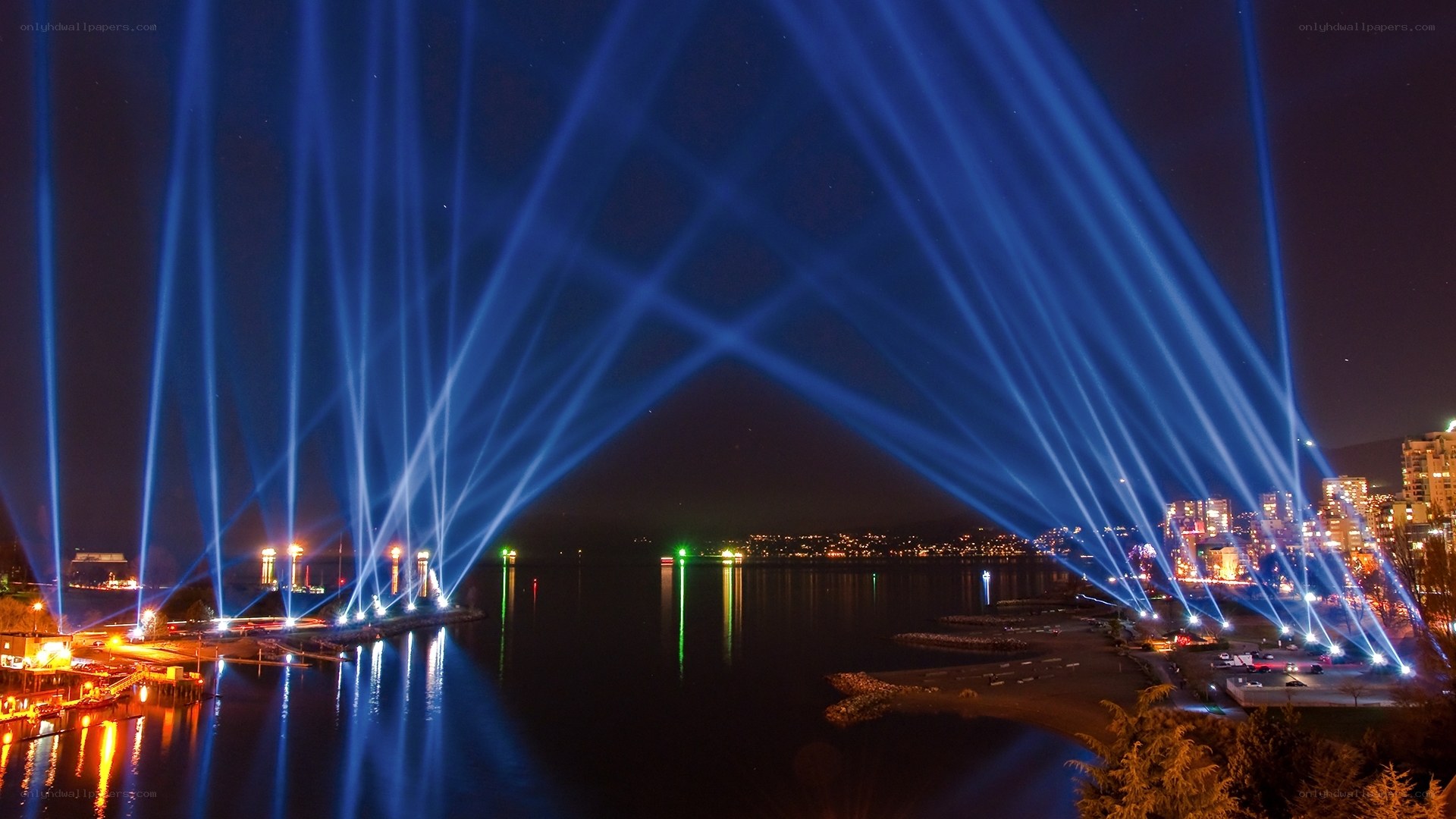 Blue laser lights over water