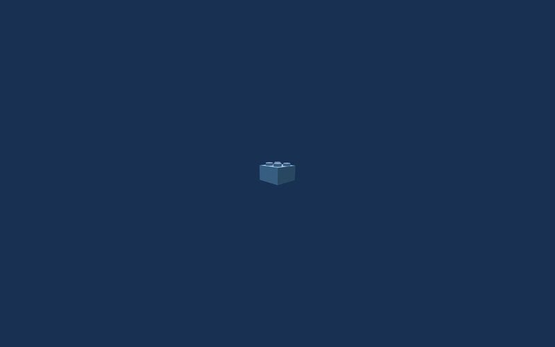 blue lego brick on dark background