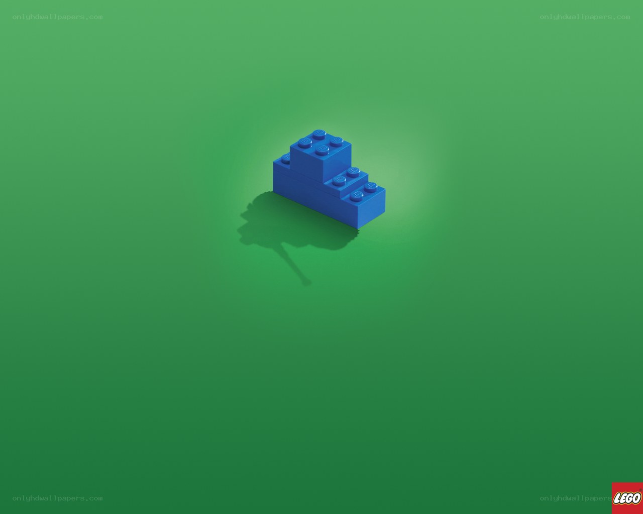 Blue Lego brick on green