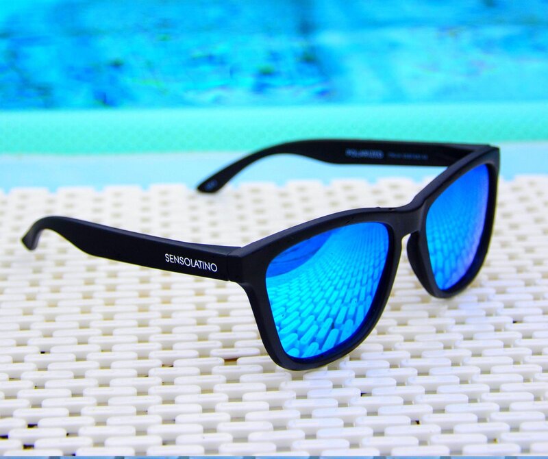 blue lens sunglasses by pool