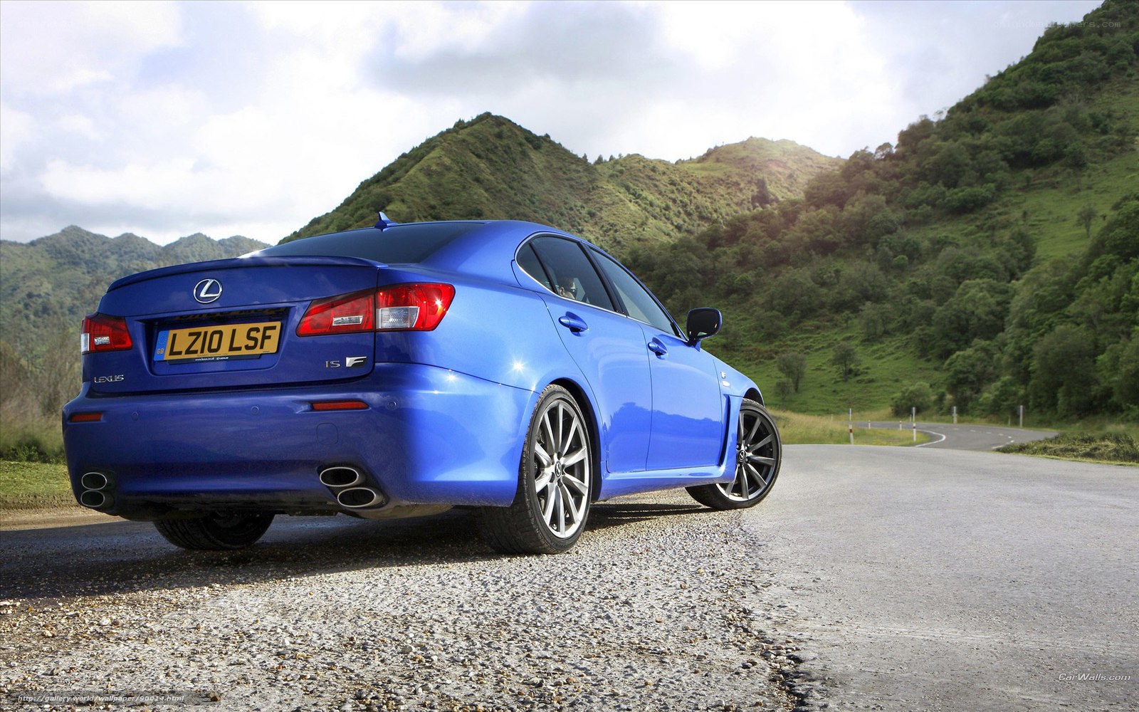 Blue Lexus IS F on a mountain road