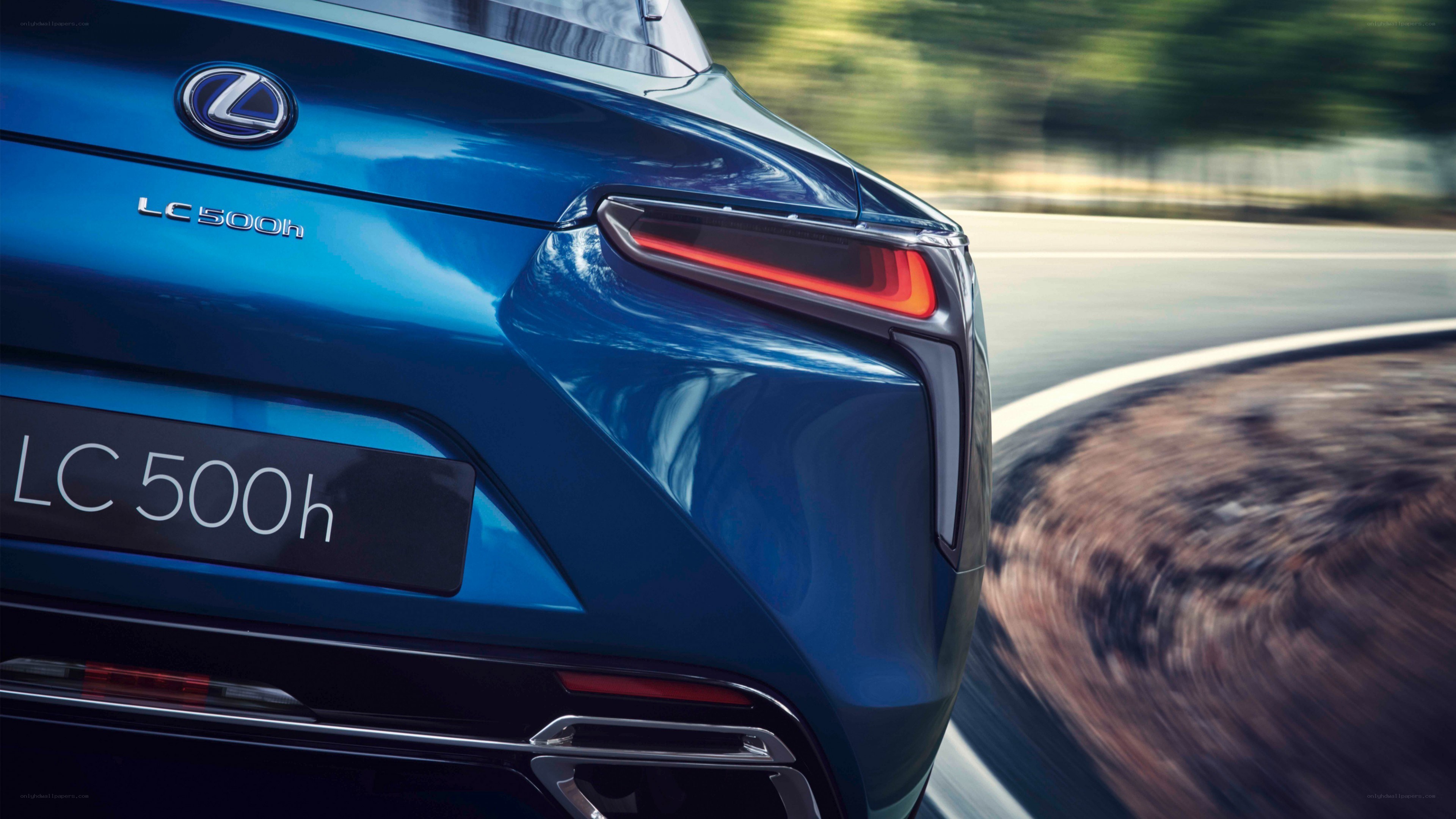 Blue Lexus LC 500h in motion