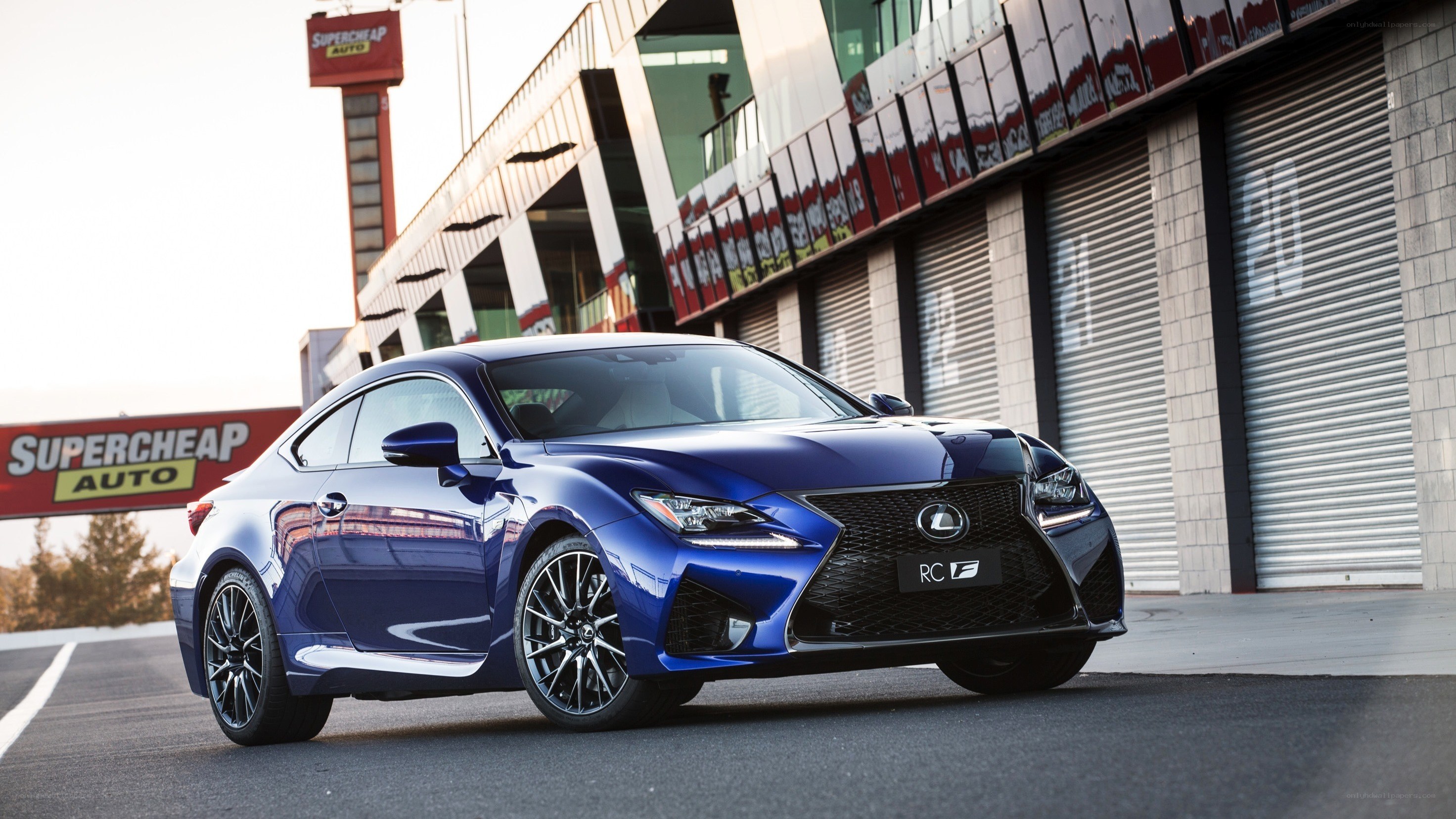 Blue Lexus RC F on racetrack