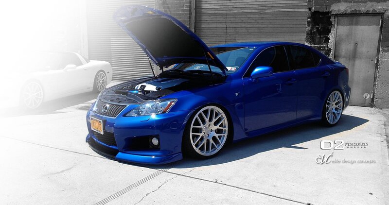 Blue Lexus with open hood