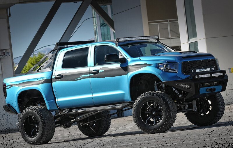 Blue Lifted Pickup Truck — Dramatic, Afternoon