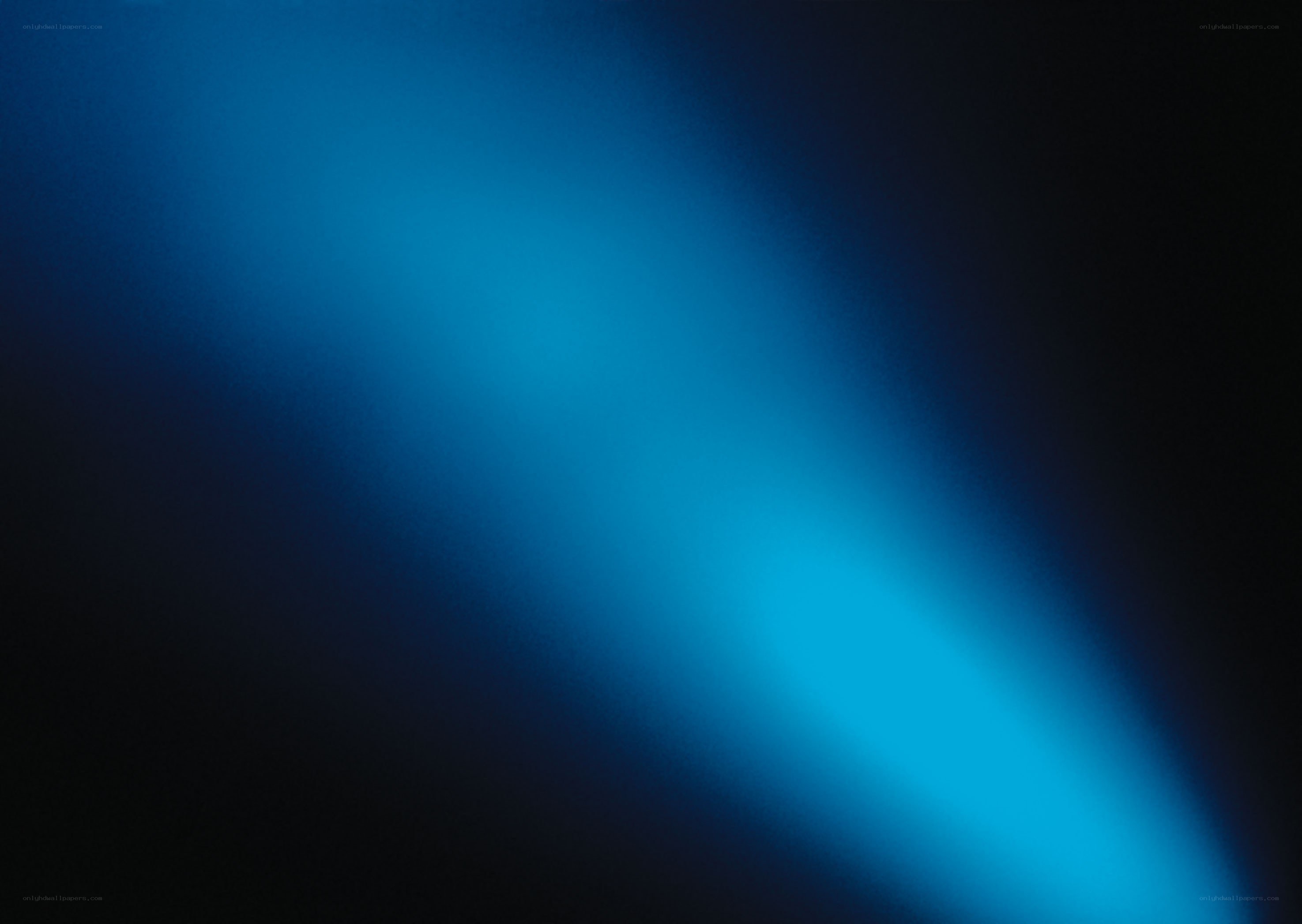 blue light beam on dark background