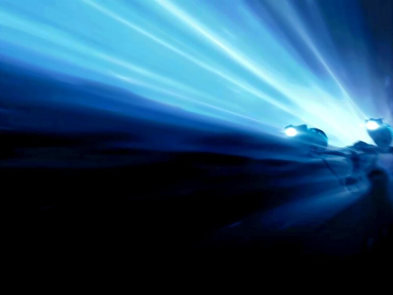 blue light beams from underwater