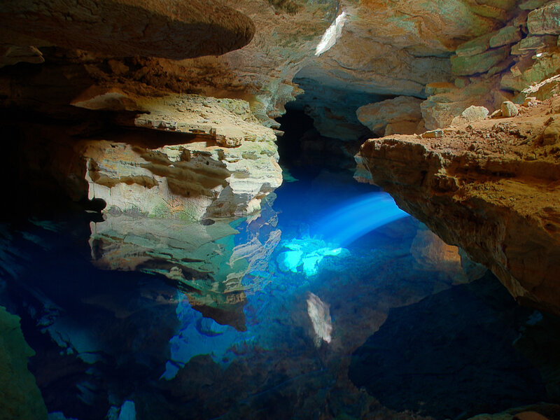 Blue light in cave pool