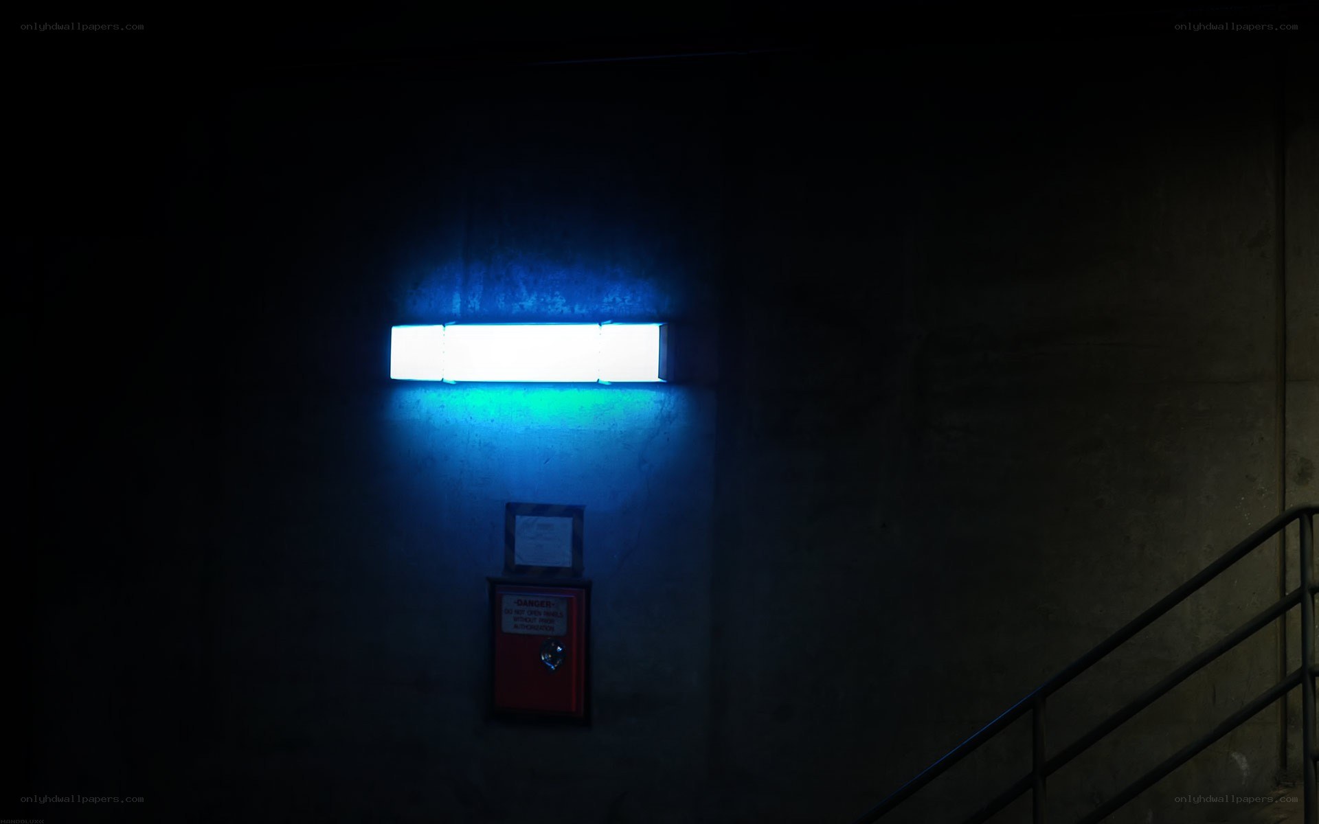 Blue light in dark hallway