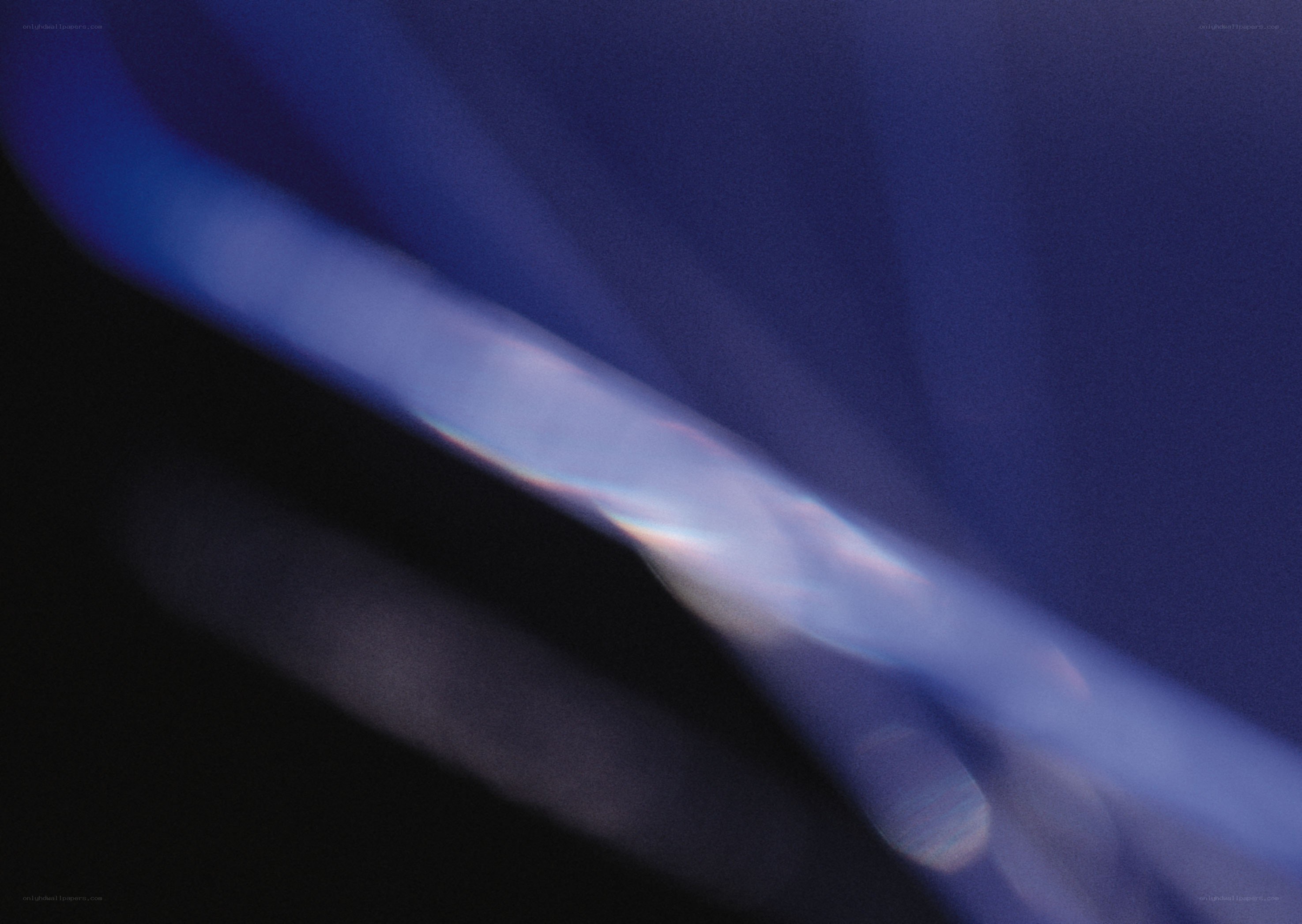 blue light streak on dark background