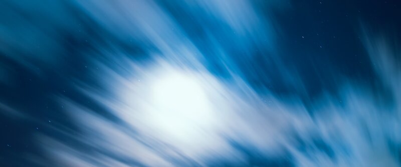 Blue Light Streaks in Sky