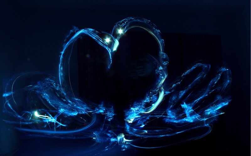 Blue Light Trails Forming Heart