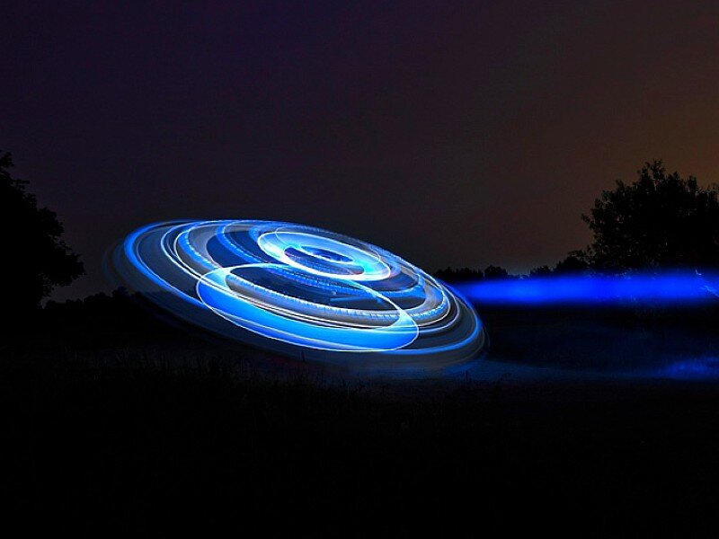 Blue light trails in a field