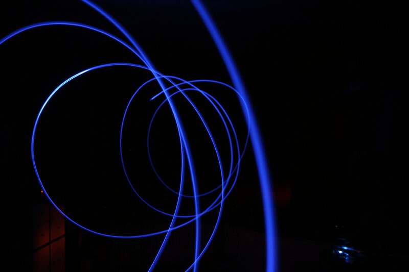 Blue light trails in darkness