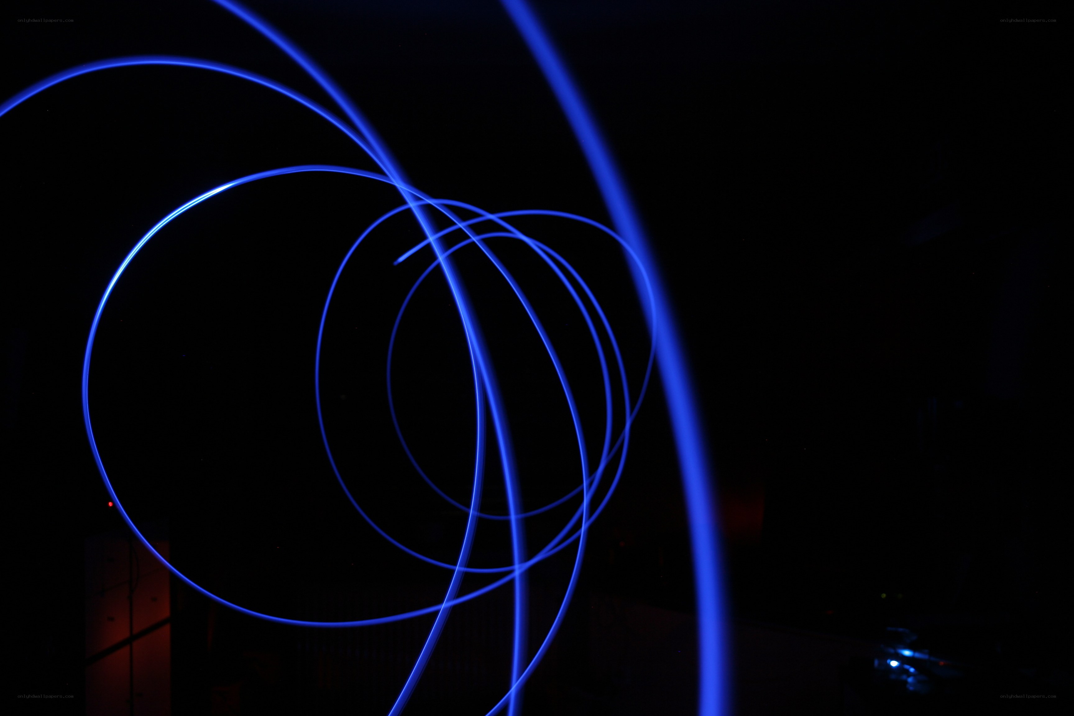 Blue light trails in darkness