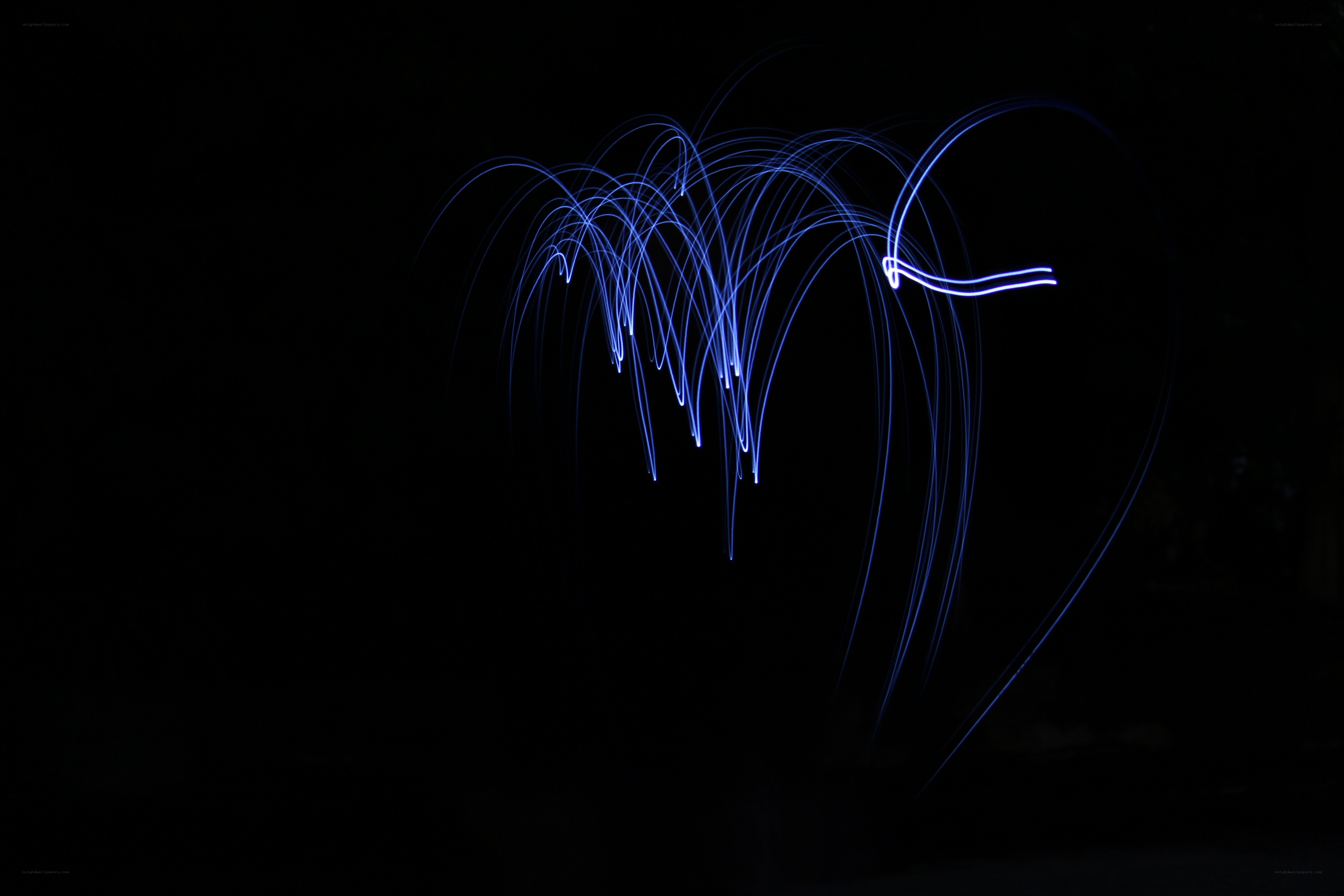 blue light trails in darkness