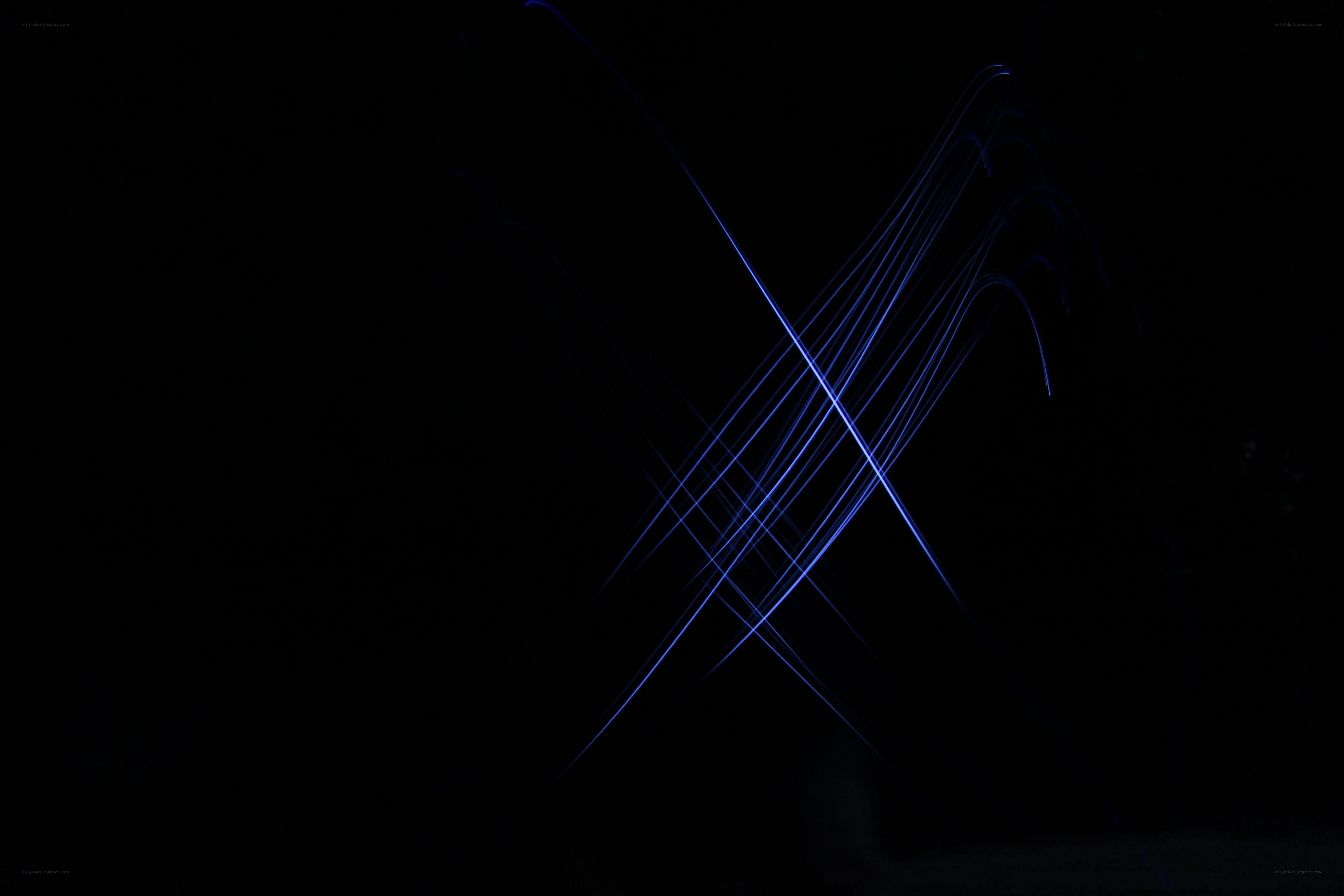 blue light trails on black
